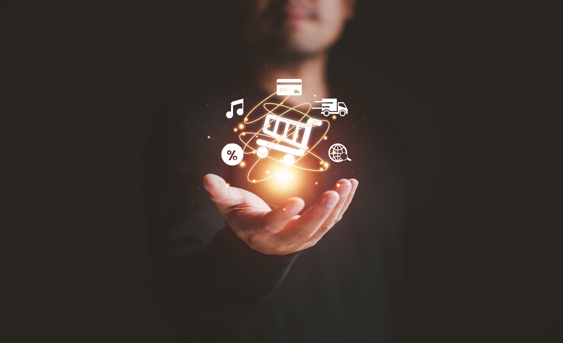 man hand holding virtual info graphics with business ecommerce and trolley cart icons , Technology online shopping business concept. internet network online shop store.