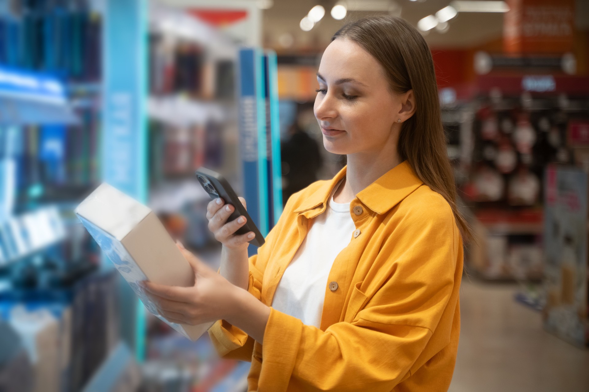 Smart shopper scans purchases for easier checkout and inventory management in a retail store